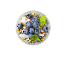 Tasty oatmeal with blueberries, coconut and mint on white background, top view. Healthy breakfast