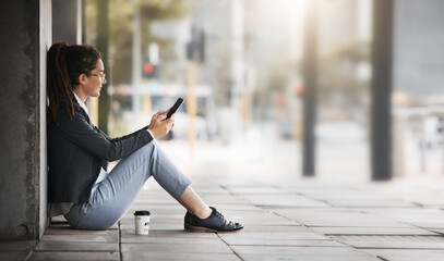 Phone, woman and coffee break in the city, street or job search, employment or network on social...