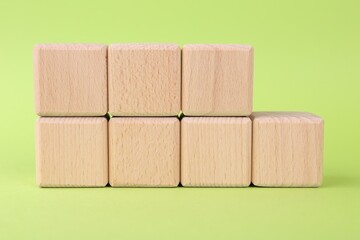 International Organization for Standardization. Wooden cubes with abbreviation ISO and number 9001...