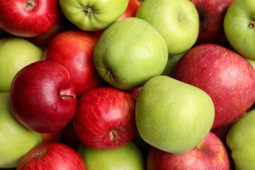 Ripe red and green apples as background, top view