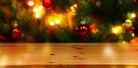 Empty wooden table near Christmas tree. Banner with space for design