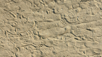 Footwear marks on the beach 