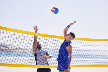Beach, volleyball and men at net with sports action, fun and summer competition with motivation to win. Energy, ocean games and volley challenge with team hitting ball for goal at workout in nature. - obrazy, fototapety, plakaty