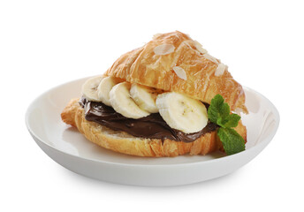 Delicious croissant with banana, chocolate and mint isolated on white
