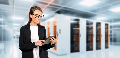 Woman using tablet in data center cloud storage with computers in racks. Ai generative