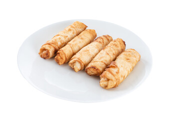 Fried spring rolls on a white plate.