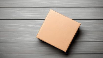 Blank cardboard parcel box on a gray wooden surface. Top down view. Generative AI.