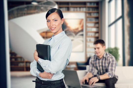 Mature smart businesswoman standing in office, AI generated image
