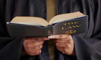Hands, law or lawyer reading book, constitution research or education for learning the justice...