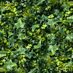 Obraz premium Lush bright green artificial plants as background