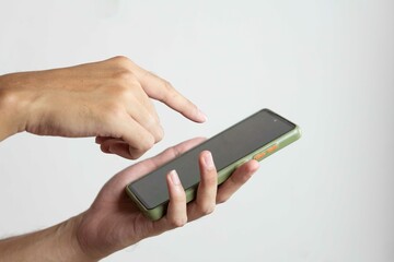 Close up man hand holding black smartphone isolated on white background, clipping path