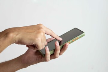 Close up man hand holding black smartphone isolated on white background, clipping path