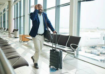 Foto op Canvas Airport, late and running black man for business flight, plane journey and travel terminal. Businessman, hurry and rush to board airplane with anxiety, stress and fast walking with suitcase luggage © Nina L/peopleimages.com