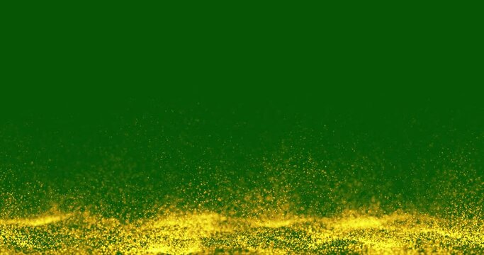 Slow-motion golden glitter particles on green screen