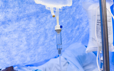 drug infusion drips, symbolizing the delicate balance of life and healing in healthcare settings