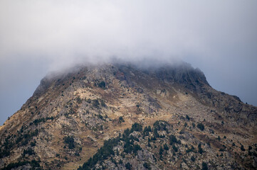 Fototapeta na wymiar Mountain with fog in the Pyrenees in Andorra.