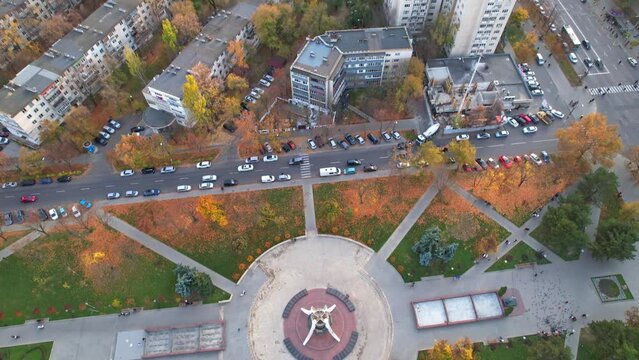 Panoramic aerial view of Afghanistan Park, unofficial name of park located in center of Rascani district, heart of which is Memorial Complex Sons of Fatherland ,Holy Remembrance. Chisinau, Moldova.4K.