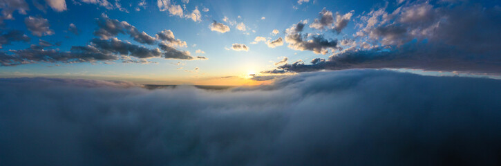 Fototapeta na wymiar Sunset above the Fog