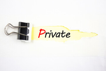 PRIVATE text, acronym on torn paper. Private inscription.