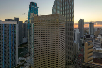Evening urban landscape of downtown district of Miami Brickell in Florida, USA. Skyline with high skyscraper buildings and urban transportation system in modern american megapolis
