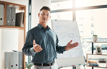 Fototapeta premium Businessman, coaching and whiteboard in FAQ, presentation or leadership at office workshop. Male leader, coach or mentor speaking in staff training for marketing, planning or corporate strategy