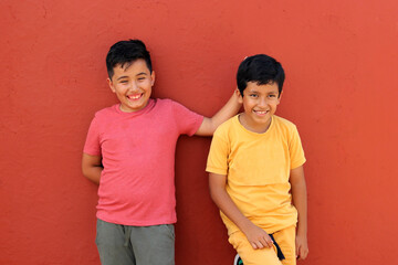 9-year-old Latino children get upset and bully each other as a form of physical, psychological,...