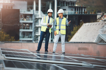 Solar panels, engineering and people with tablet for construction, maintenance and renewable...