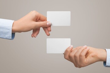 Human hands is hold credit card on background.