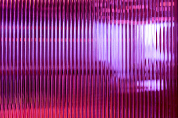 Abstract creative image on patterned glass show vertical lines pattern repetition blurry background...