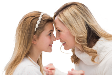 Digital png photo of caucasian mother and daughter smiling at each other on transparent background