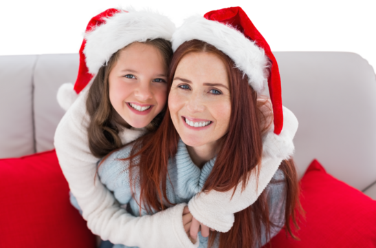 Digital png photo of smiling caucasian mother and daughter in santa hats on transparent background