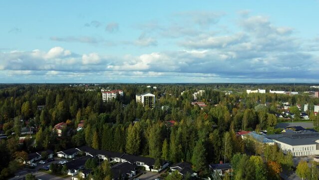 Bird's eye view of Kerava a rustic town with lots of greenery in Finland, tranquility and a clear horizon, Nordic summer.