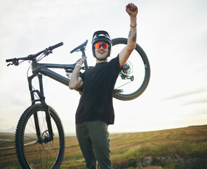 Mountain bike, man and celebrate success outdoor in nature for sports training or workout. Winner,...
