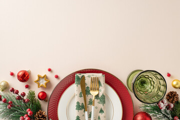 A top view of a chic New Year's dinner table arrangement for family gatherings. Plates, gold...