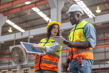 Factory metal workers install solar panels, cut costs, earn carbon credits, combat climate change.