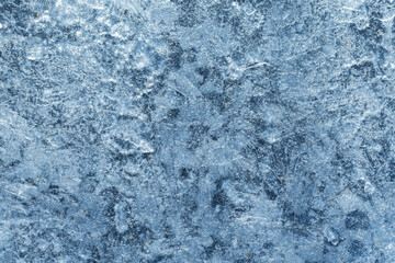 Fototapeta na wymiar Shiny blue ice wall surface, macro pattern, natural background