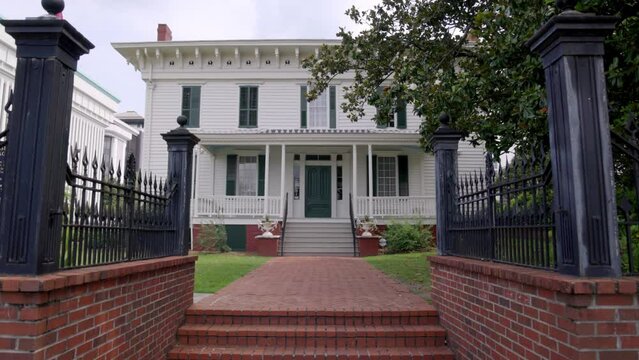 First White House of the Confederacy in Montgomery, Alabama with gimbal video walking forward in slow motion.