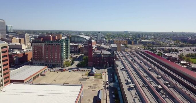 Aerial establishing shot of downtown Indianapolis revealing a clocktower