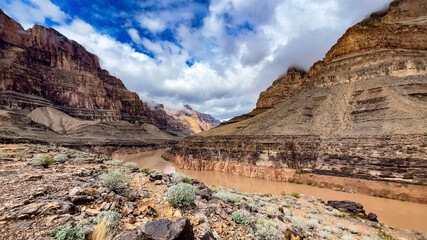 The famous west gate of the Grand Canyon of the Colorado crossing the famous river through its...