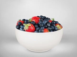 Colorful tasty fresh berry Salad in bowl