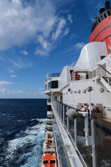Red and black funnel of classic ocean liner cruise ship cruiseship Elizabeth or Victoria against...