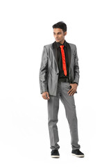 Young Indian man looking left.