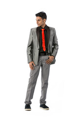 Young Indian man looking away.