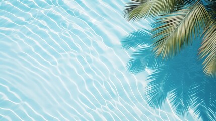 Aqua waves and coconut palm shadow on blue background. Water pool texture top view.Tropical summer...