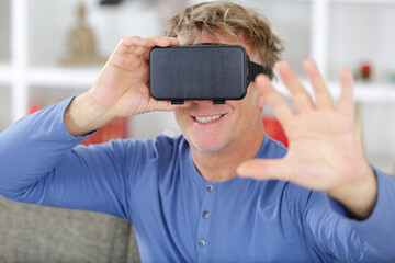 man wearing virtual reality in modern in studio