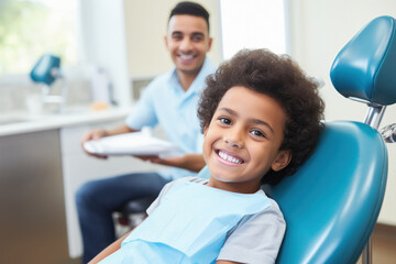 Smiling indian girl sitting on a chair at the dental clinic