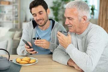 happy two generations men together at home