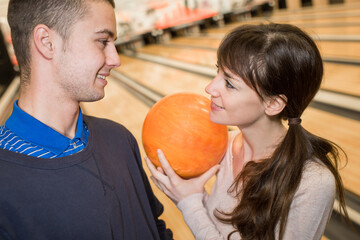 Fototapeta premium beautiful couple dating and bowling