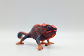 chameleon toy miniature on white background