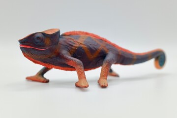 chameleon toy miniature on white background